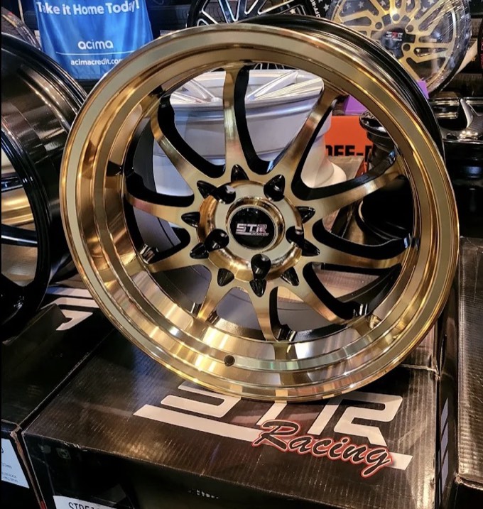 Bronze STR Racing wheel with black accents at Smart Tire El Paso