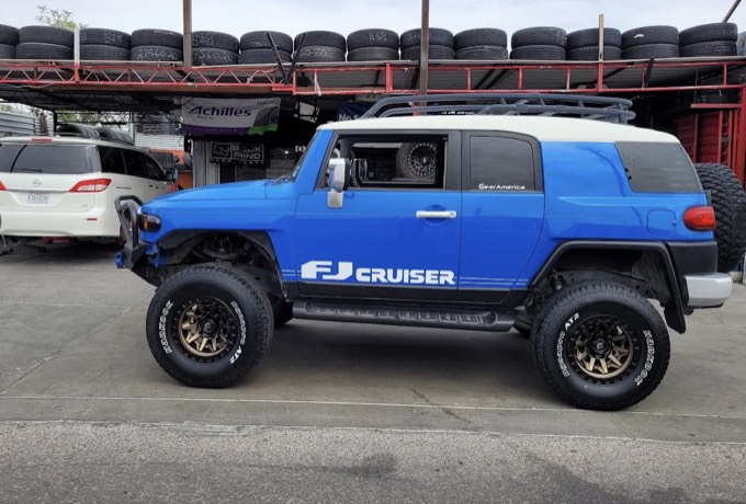 Lifted blue Toyota FJ Cruiser on Hankook all-terrain tires at Smart Tire El Paso
